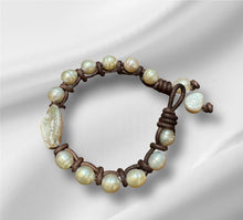 Load image into Gallery viewer, Women’s Natural Freshwater pearls on genuine hand rolled leather bracelet
