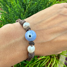 Load image into Gallery viewer, Women’s Evil Eye and Natural fresh water pearls on genuine hand rolled leather bracelet
