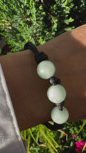 Load and play video in Gallery viewer, Women’s Natural Green Moonstone on genuine hand rolled leather Mala Bracelet
