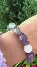 Load and play video in Gallery viewer, Women’s Natural Fluorite, Labradorite and Rose Quartz on genuine hand rolled leather Mala Bracelet
