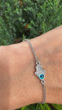 Load and play video in Gallery viewer, Women’s Evil Eye adjustable sterling silver bracelet
