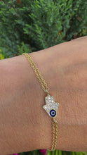 Load and play video in Gallery viewer, Women’s Evil Eye adjustable 14K gold plated sterling silver bracelet
