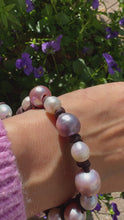 Load and play video in Gallery viewer, Women’s Natural Lavender and White pearls on genuine hand rolled leather bracelet
