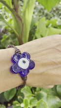 Load and play video in Gallery viewer, Women’s Flower Evil eye 🧿 on genuine hand rolled leather bracelet
