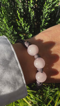 Load and play video in Gallery viewer, Women’s Natural Rose Quartz on genuine hand rolled leather Mala Bracelet
