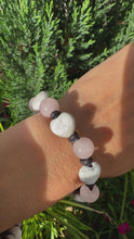 Load and play video in Gallery viewer, Women’s Natural Rose Quartz and Howlite on genuine hand rolled leather bracelet
