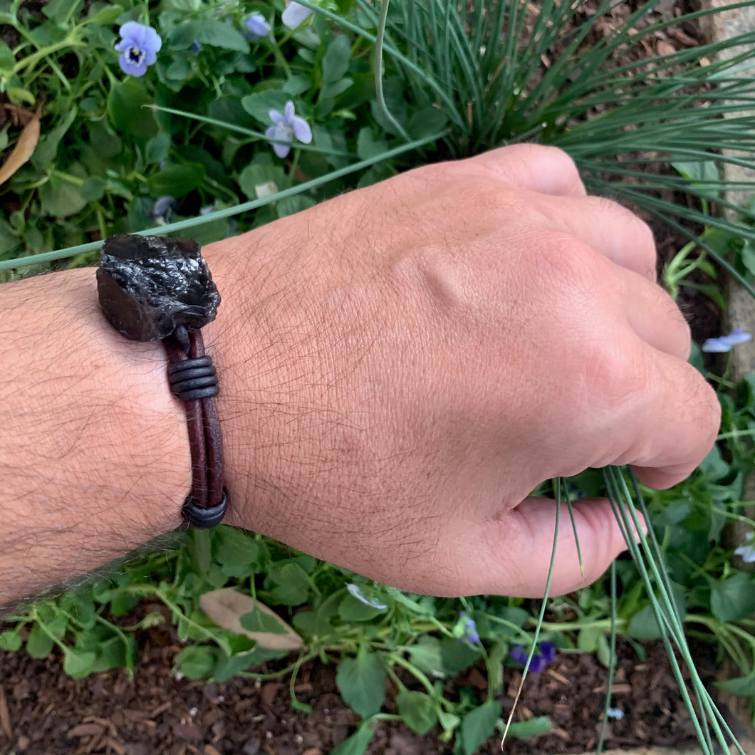 Men's natural obsidian bracelet with silver buffalo nickel clasp on brown/black leather