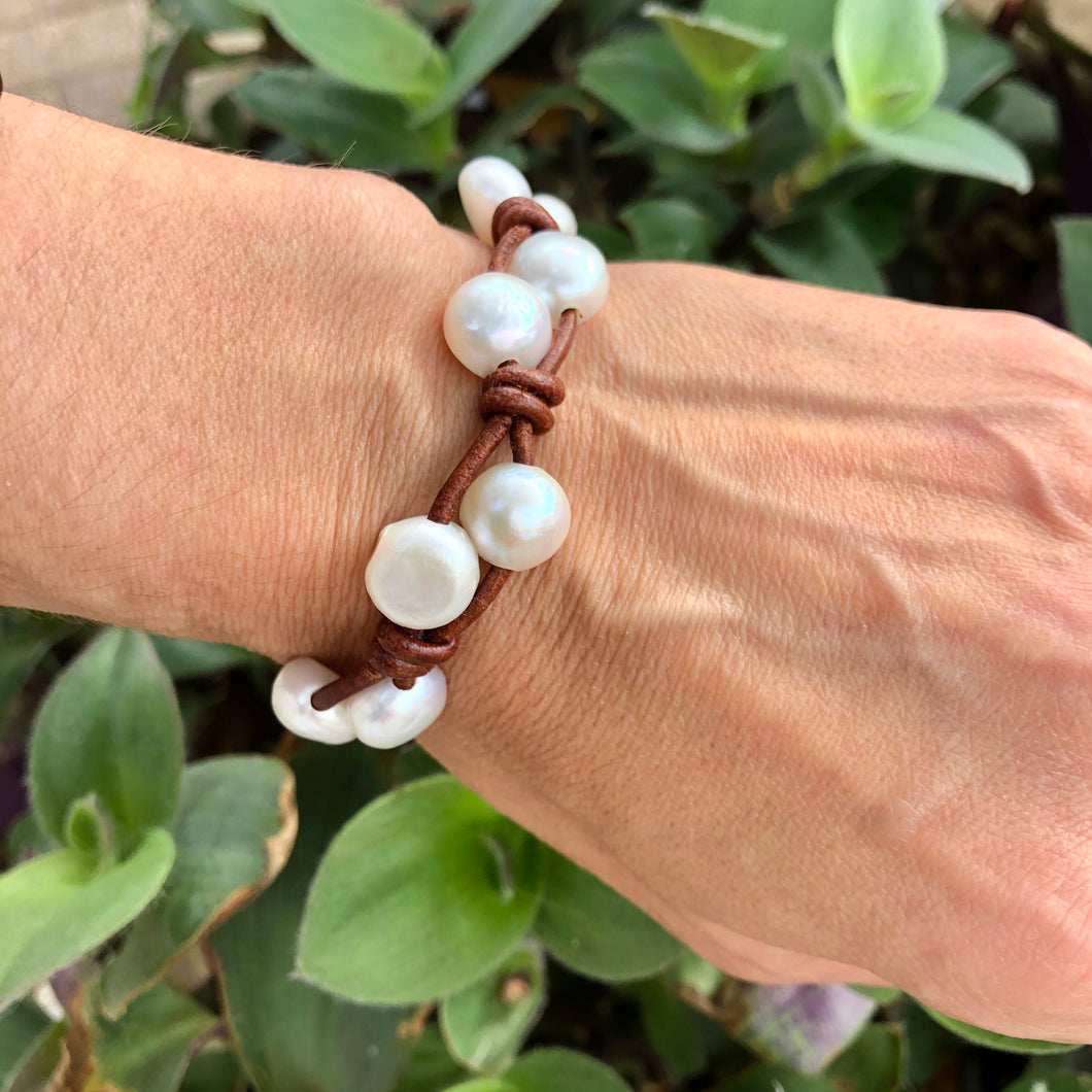 Women's white pearl bracelet with brown leather