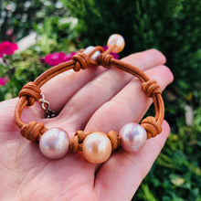 Load image into Gallery viewer, Women’s three pink pearls on light brown leather bracelet
