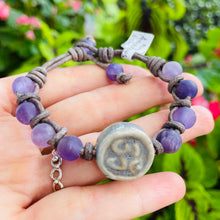 Load image into Gallery viewer, Women’s Natural Amethyst Om Mala style bracelet on genuine leather
