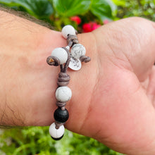 Load image into Gallery viewer, Men&#39;s natural Howlite and Black Onyx on genuine leather Mala style bracelet
