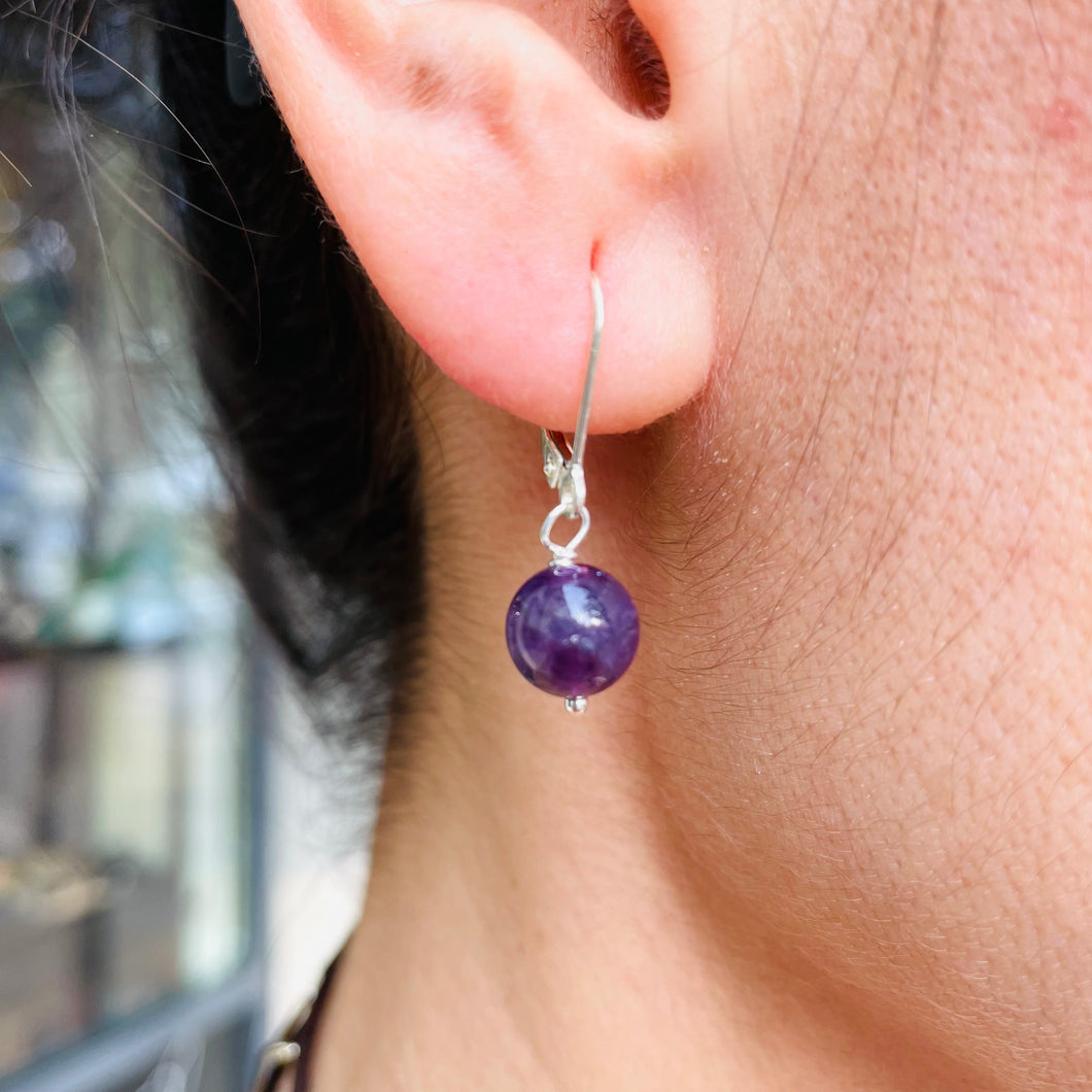 Women’s amethyst earrings on sterling silver